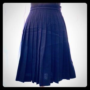 Liz Claiborne 100% wool unlined pleated skirt.